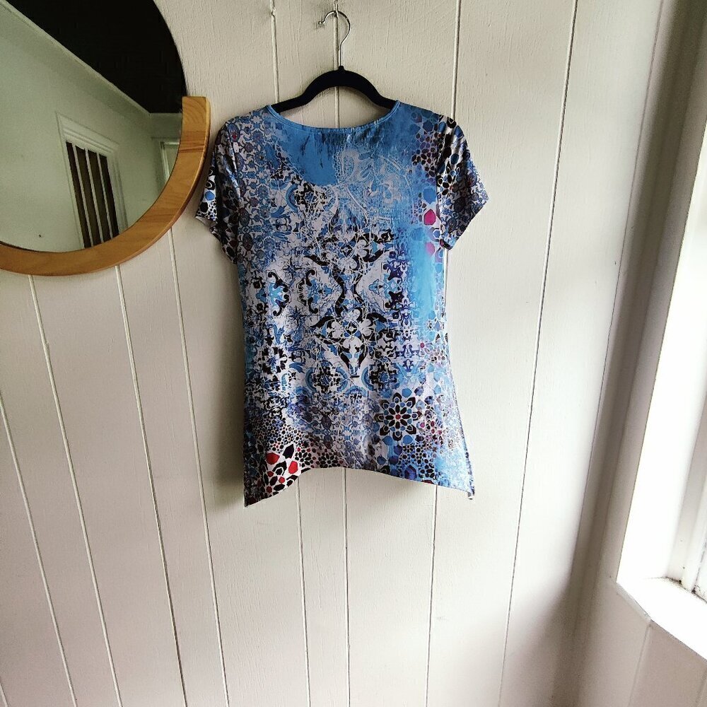 Summer top in white light blue and red. Has a sprinkling of bling sequins. Sz S